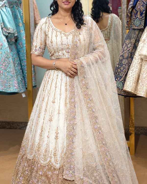 The Ivory Champagne Royale Lehenga